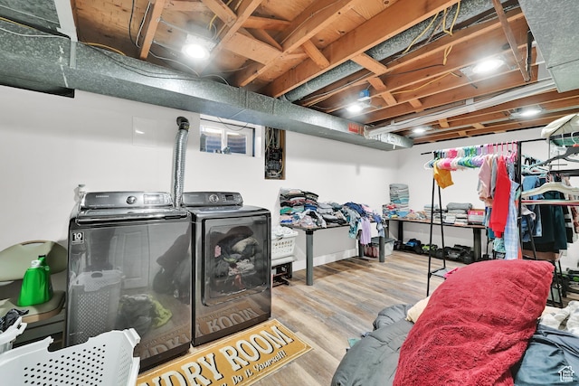 142 Green St, Layton, UT 84041 - laundry area with light wood-type flooring and washer and dryer