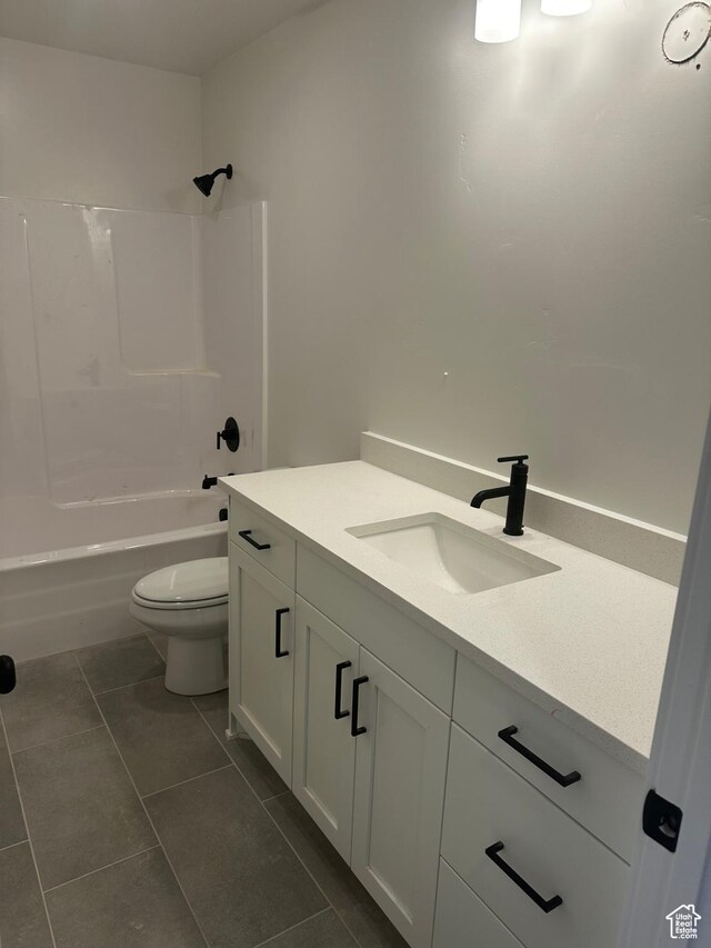 595 W 330 S, American Fork, UT 84003 - bathroom featuring shower / bathing tub combination, toilet, tile patterned flooring, and vanity