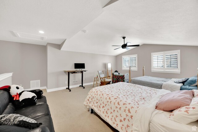 bedroom with ceiling fan, light colored carpet, and lofted ceiling