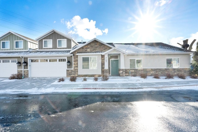 craftsman-style home with a garage