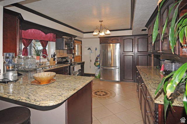 1144 E 1200 S, Ogden, UT 84404 - kitchen with stainless steel appliances, a sink, a chandelier, a peninsula, and light tile patterned floors
