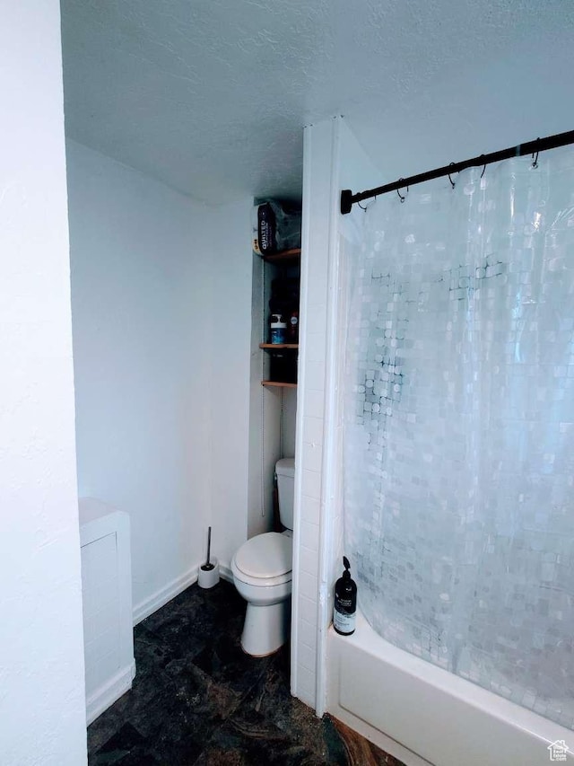 3260 Ogden Ave, Ogden, UT 84401 - bathroom featuring a textured ceiling, toilet, and shower / tub combo with curtain