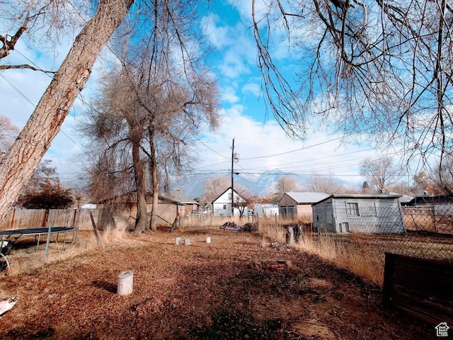 3260 Ogden Ave, Ogden, UT 84401 - view of yard with a trampoline