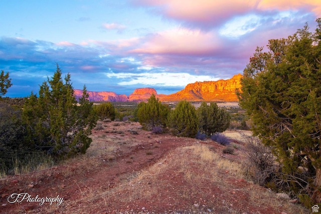 nature at dusk featuring a mountain view