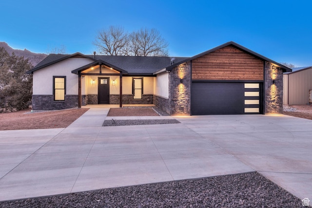 view of front of property with a garage