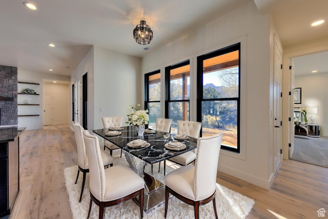 dining space with light wood-type flooring