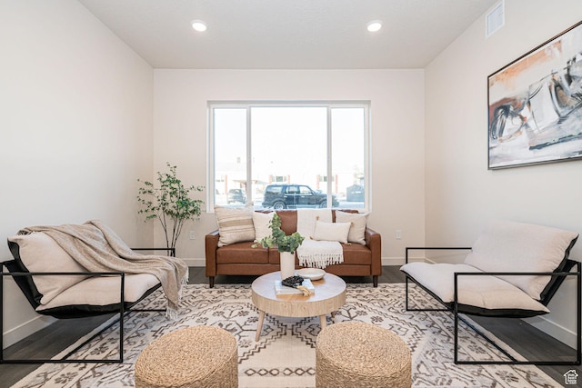living area with light hardwood / wood-style floors