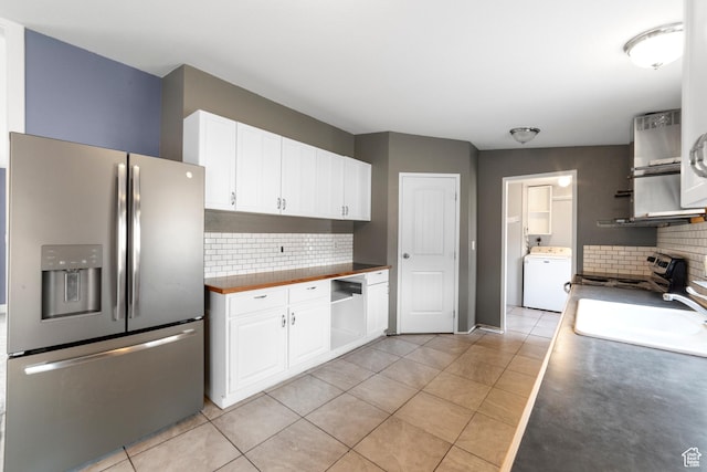 112 Arbor Dr, Moab, UT 84532 - kitchen with sink, white cabinetry, stainless steel appliances, and washer / clothes dryer