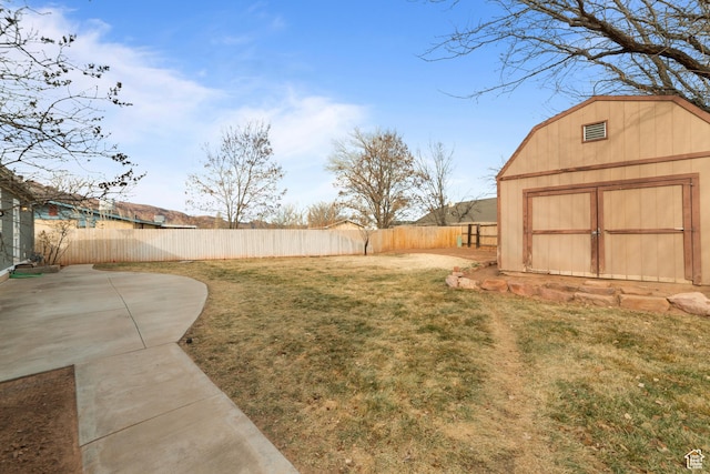 112 Arbor Dr, Moab, UT 84532 - view of yard featuring a patio area and an outdoor structure