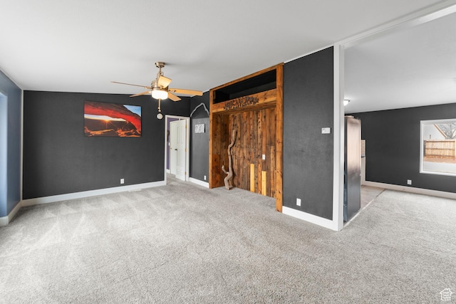 112 Arbor Dr, Moab, UT 84532 - interior space featuring ceiling fan, stainless steel refrigerator, and light colored carpet