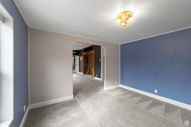 112 Arbor Dr, Moab, UT 84532 - carpeted spare room featuring a textured ceiling