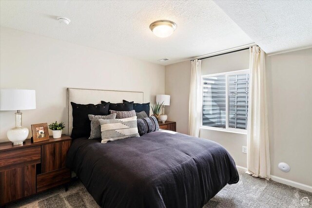 6158 W 11800 S Unit 504, South Jordan, UT 84009 - carpeted bedroom featuring a textured ceiling