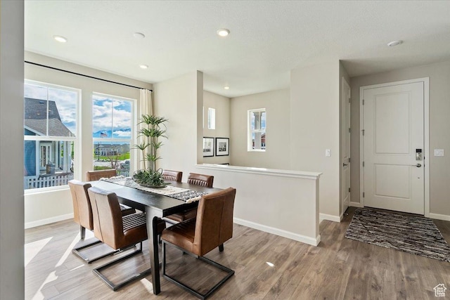 6158 W 11800 S Unit 504, South Jordan, UT 84009 - dining area with wood finished floors and recessed lighting