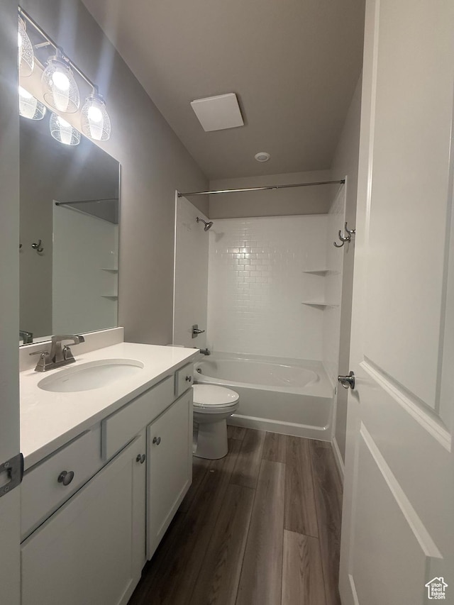6158 W 11800 S Unit 504, South Jordan, UT 84009 - bathroom featuring vanity, wood finished floors, and shower / washtub combination