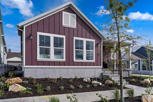 6158 W 11800 S Unit 504, South Jordan, UT 84009 - view of property exterior with board and batten siding