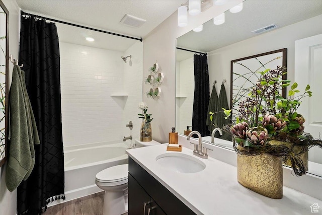 6158 W 11800 S Unit 504, South Jordan, UT 84009 - bathroom featuring wood finished floors, vanity, and shower / bathtub combination with curtain