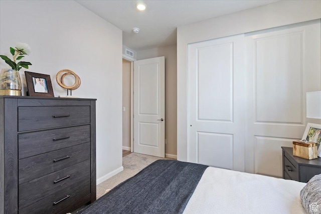 6158 W 11800 S Unit 504, South Jordan, UT 84009 - carpeted bedroom featuring a closet and baseboards