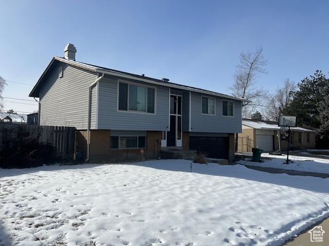 raised ranch with a garage