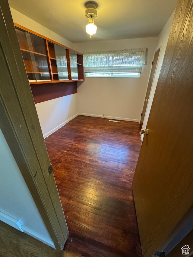 3375 S Meadowlark Dr, West Valley City, UT 84119 - unfurnished room featuring wood finished floors and baseboards