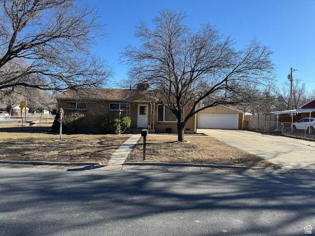 3375 S Meadowlark Dr, West Valley City, UT 84119 - ranch-style home with brick siding, driveway, and a garage