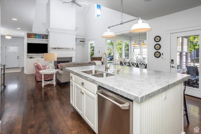 2025 W Orchard Harvest Dr, Kaysville, UT 84037 - kitchen with pendant lighting, dishwasher, sink, white cabinets, and a center island with sink