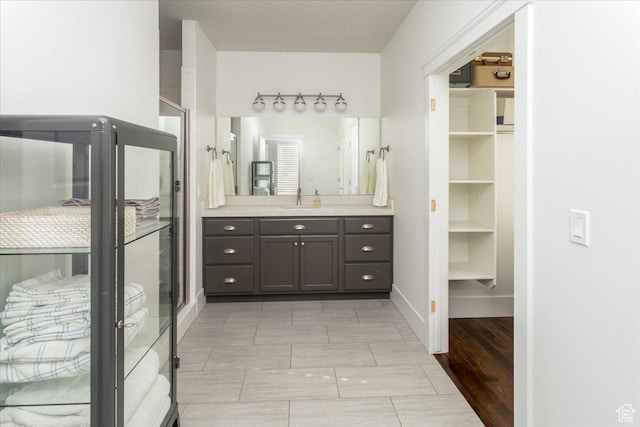 2025 W Orchard Harvest Dr, Kaysville, UT 84037 - bathroom with vanity and a shower with shower door