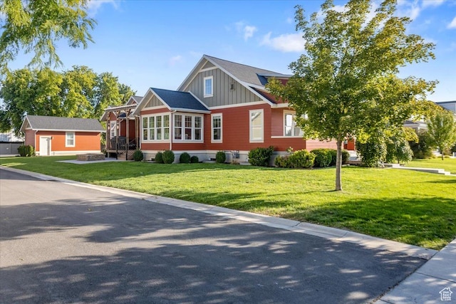 2025 W Orchard Harvest Dr, Kaysville, UT 84037 - view of front facade featuring a front yard and an outdoor structure