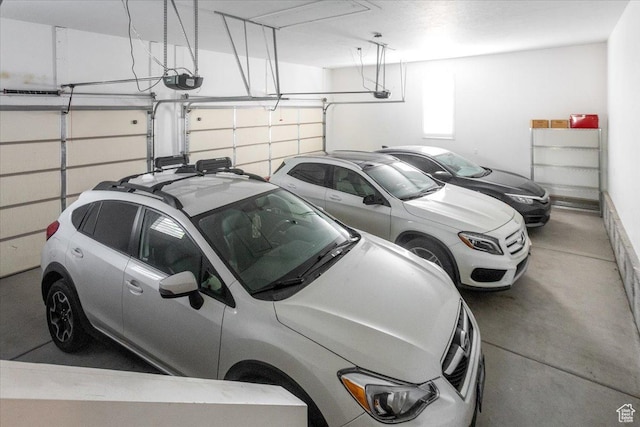 2025 W Orchard Harvest Dr, Kaysville, UT 84037 - garage with a garage door opener