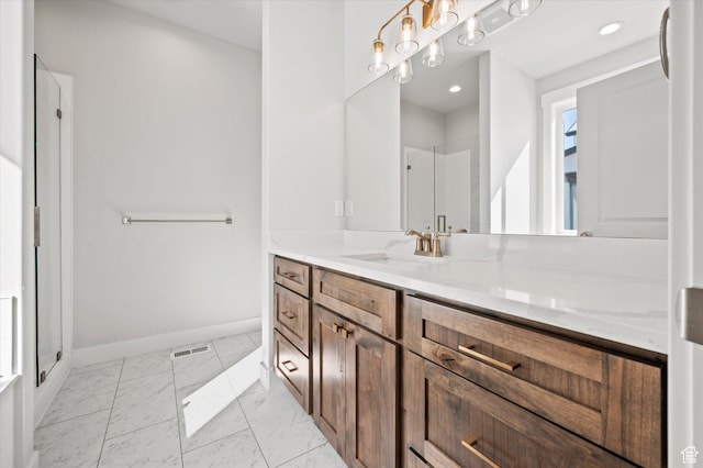 354 S 1150 E Unit 605, Smithfield, UT 84335 - bathroom featuring a shower stall, visible vents, baseboards, vanity, and marble finish floor