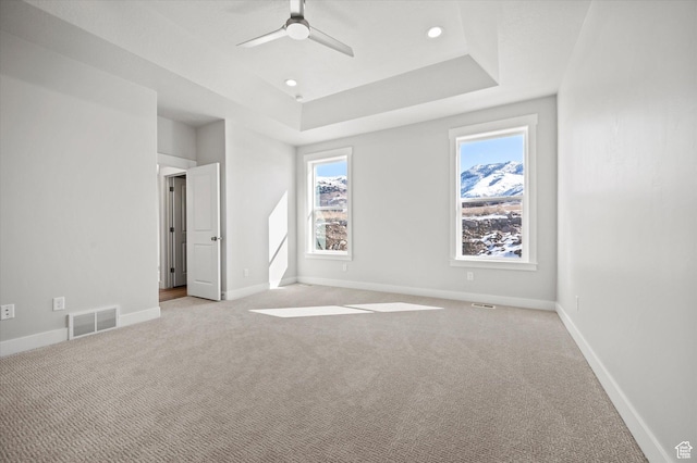 354 S 1150 E Unit 605, Smithfield, UT 84335 - unfurnished bedroom featuring visible vents, baseboards, light carpet, and a tray ceiling