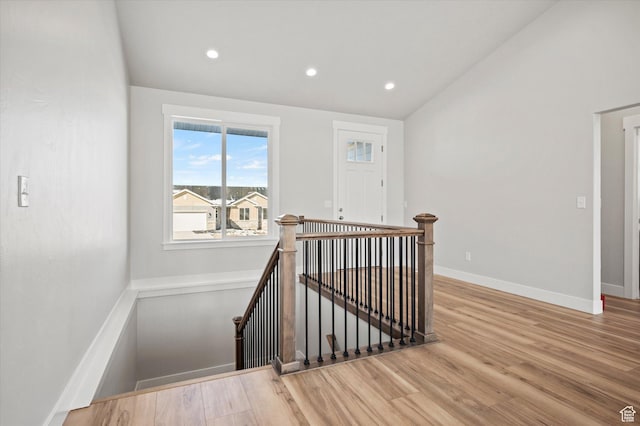 354 S 1150 E Unit 605, Smithfield, UT 84335 - stairway featuring wood finished floors, recessed lighting, vaulted ceiling, and baseboards