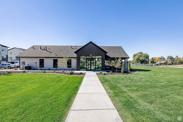 view of front of house with a front lawn