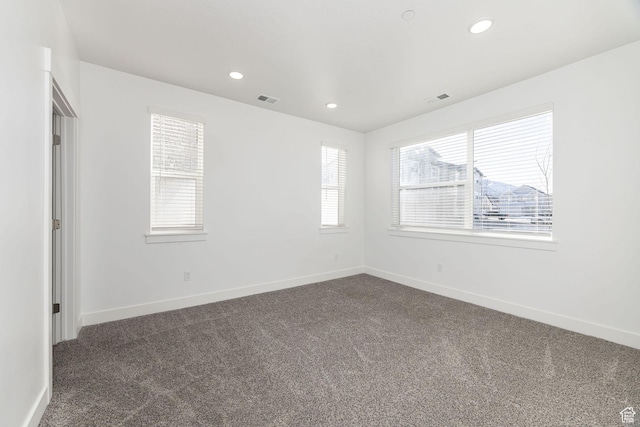 view of carpeted spare room