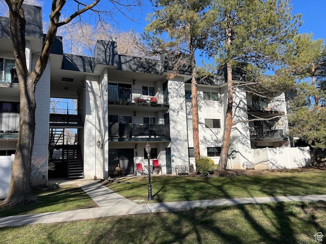 view of property with stairway