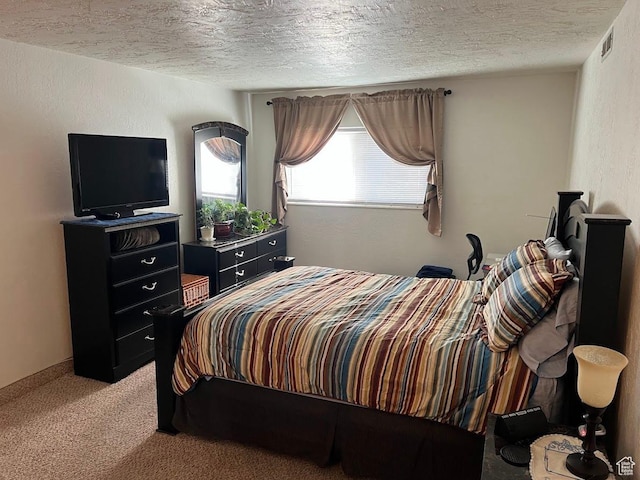 576 E Vine St Unit 2B, Murray, UT 84107 - bedroom featuring visible vents, light carpet, a textured ceiling, and a textured wall