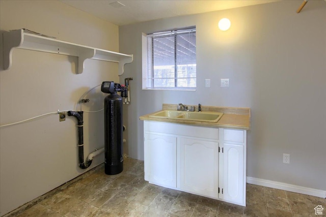 4698 Porter Ave, South Ogden, UT 84403 - laundry area with sink and cabinets