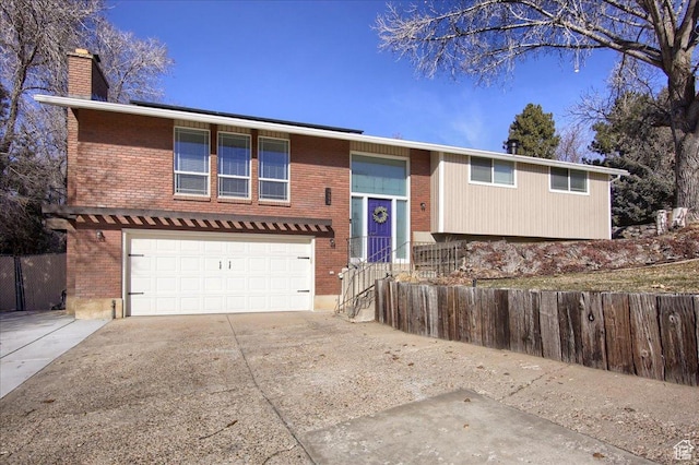 4698 Porter Ave, South Ogden, UT 84403 - bi-level home featuring a garage