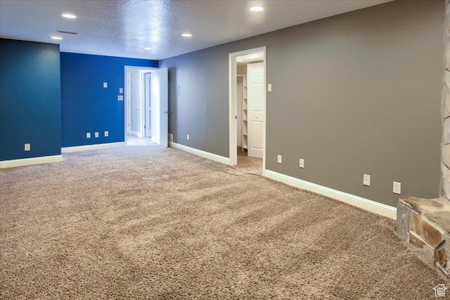 4698 Porter Ave, South Ogden, UT 84403 - carpeted empty room with a textured ceiling