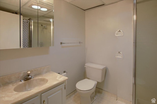 4698 Porter Ave, South Ogden, UT 84403 - bathroom with vanity, toilet, a shower, and a paneled ceiling