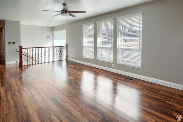 4698 Porter Ave, South Ogden, UT 84403 - spare room featuring ceiling fan and dark wood-type flooring