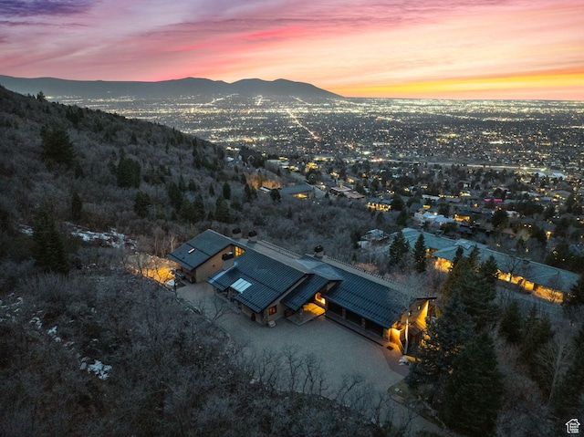 4552 S Zarahemla Dr E, Salt Lake City, UT 84124 - aerial view at dusk featuring a mountain view