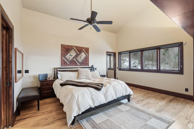 4552 S Zarahemla Dr E, Salt Lake City, UT 84124 - bedroom with light wood-style flooring, high vaulted ceiling, baseboards, and a ceiling fan