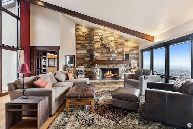 4552 S Zarahemla Dr E, Salt Lake City, UT 84124 - living area featuring wood finished floors, high vaulted ceiling, a fireplace, and beam ceiling