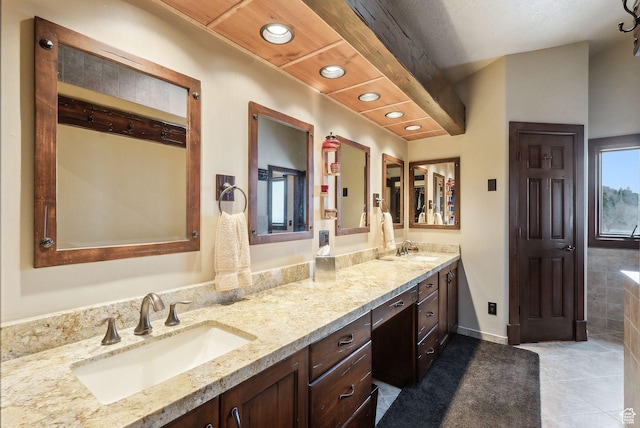 4552 S Zarahemla Dr E, Salt Lake City, UT 84124 - full bathroom featuring tile patterned floors, double vanity, a sink, and recessed lighting