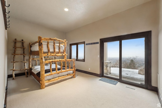 4552 S Zarahemla Dr E, Salt Lake City, UT 84124 - bedroom with access to outside, baseboards, visible vents, and carpet floors