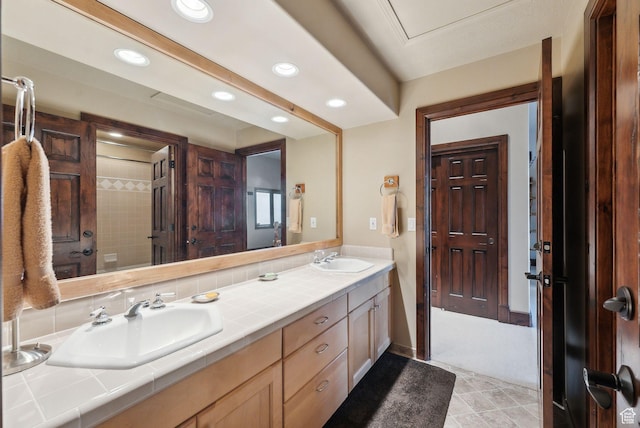 4552 S Zarahemla Dr E, Salt Lake City, UT 84124 - full bath featuring double vanity, a sink, and recessed lighting