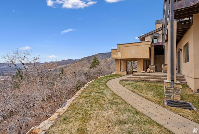 4552 S Zarahemla Dr E, Salt Lake City, UT 84124 - view of yard with a patio area, a balcony, and a mountain view