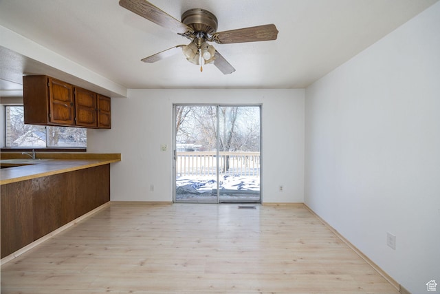2243 N 1400 E, North Logan, UT 84341 - kitchen featuring ceiling fan and light hardwood / wood-style floors