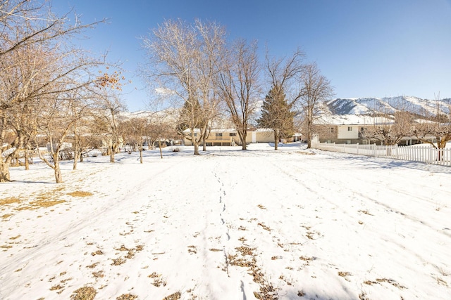 2243 N 1400 E, North Logan, UT 84341 - yard covered in snow featuring a mountain view