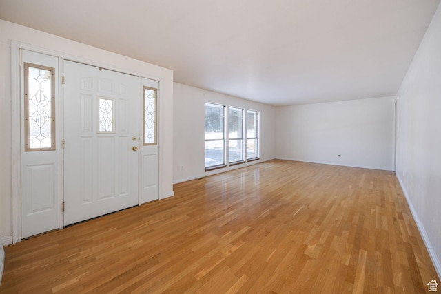 2243 N 1400 E, North Logan, UT 84341 - foyer featuring a wealth of natural light and light hardwood / wood-style floors